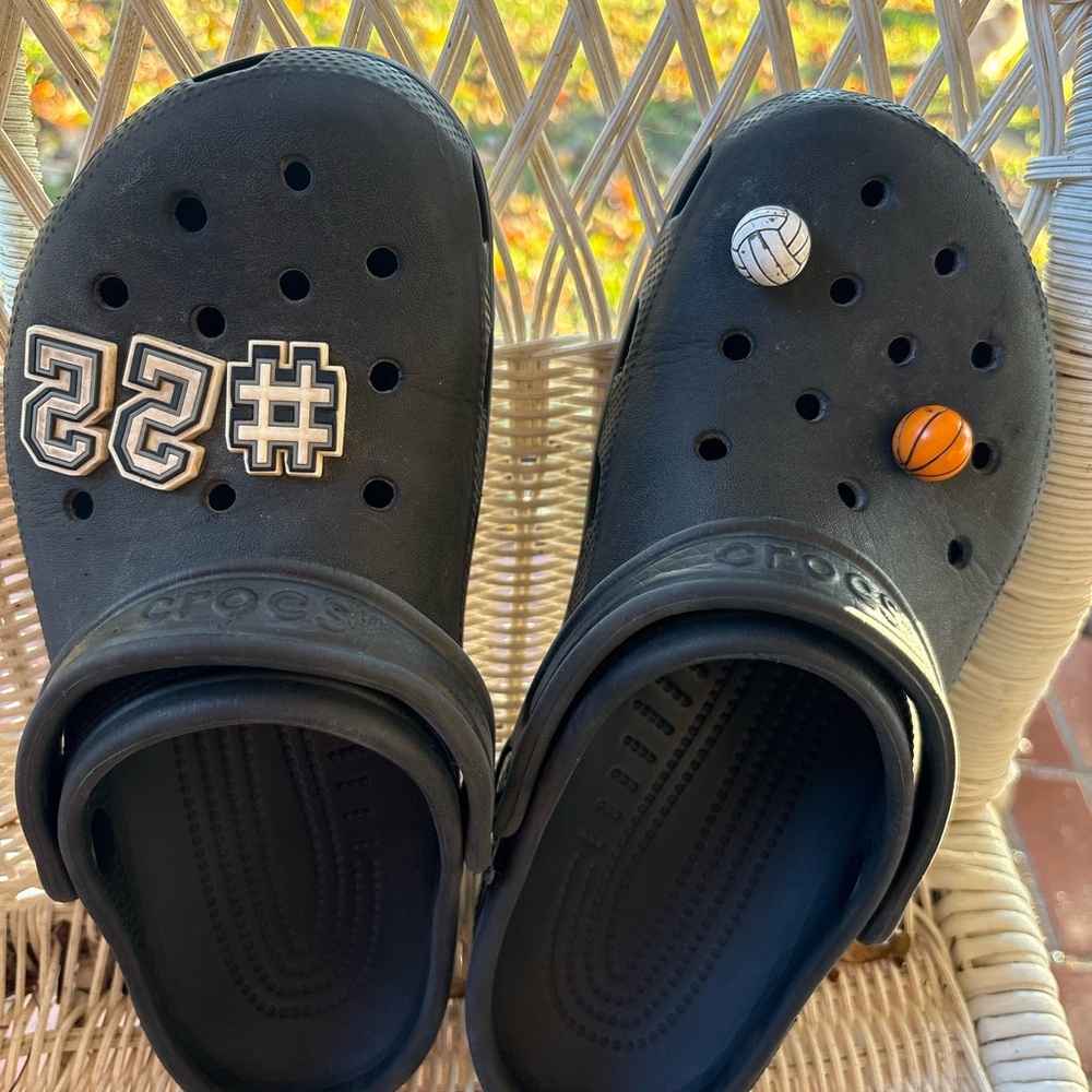 CROCS Kids Black Slippers with Sports Charms read all
